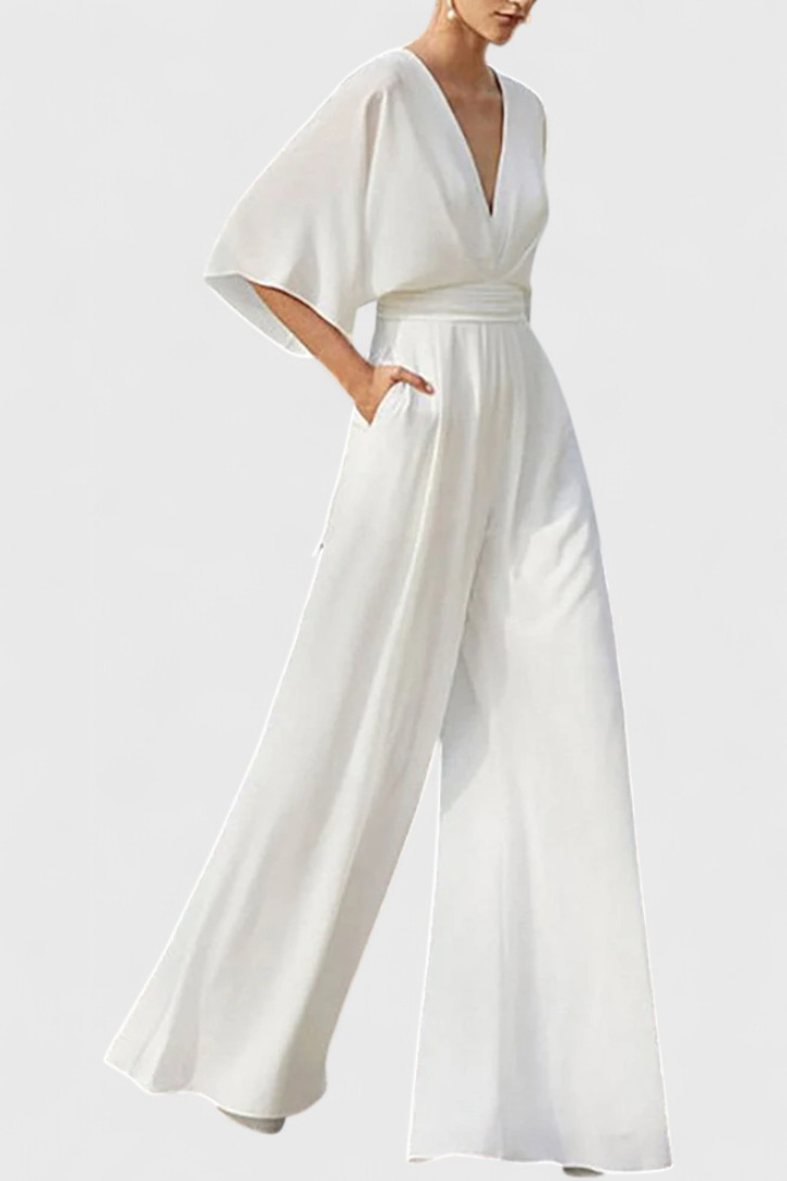 Isaura Chic Jumpsuit with Cape Sleeves and V-Neck Design